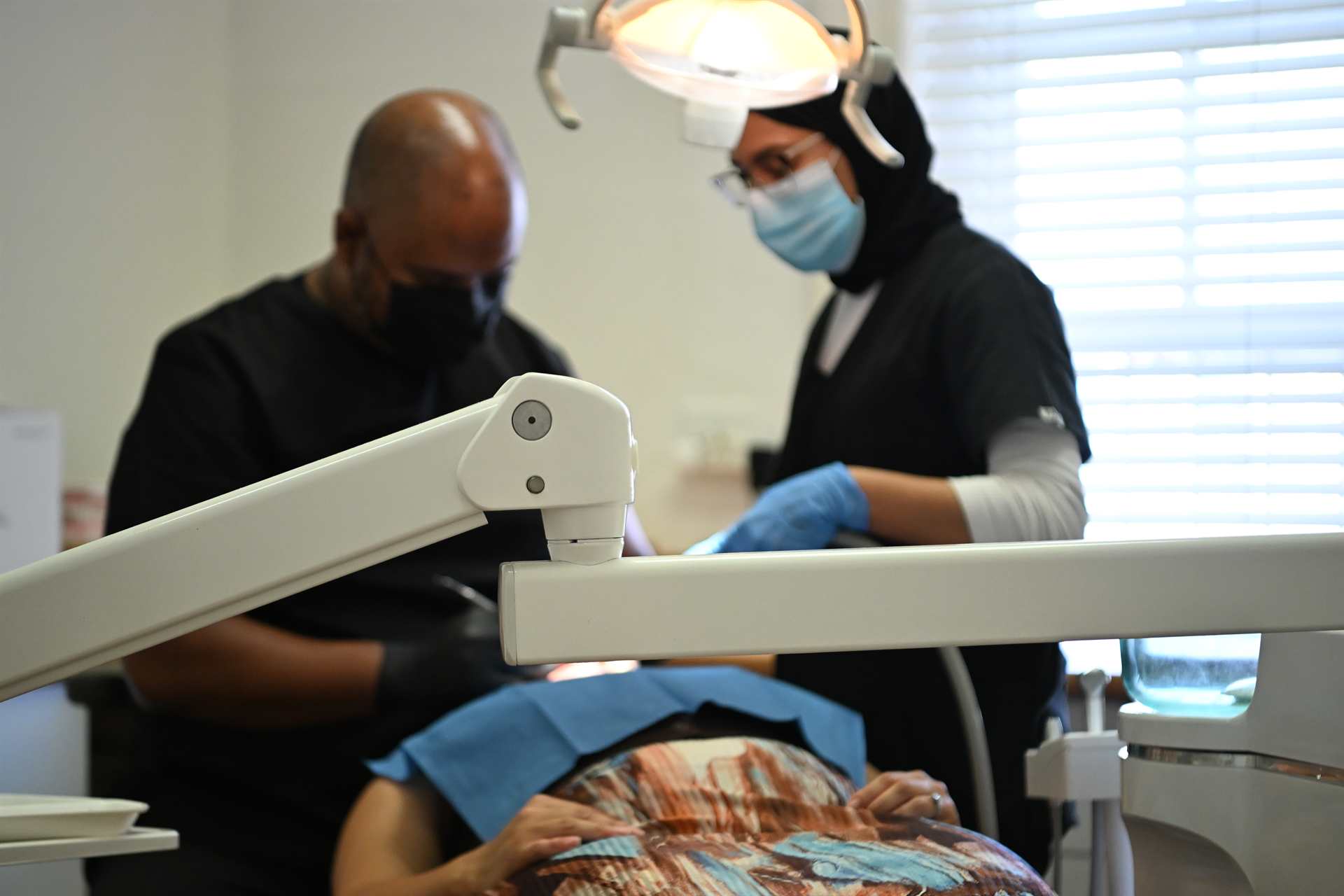 Happy patient smiling after dental treatment at Dr Kamalie Dental Surgery